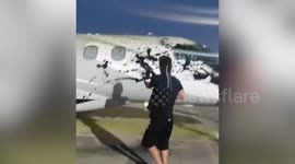 Eco-zealots attack luxury private jet at Ibiza Airport in Spain
