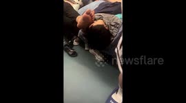 Elderly passenger's feet rest on fellow commuter's face on train, sparking outrage in China