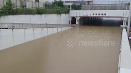 Overpass gets inundates by floods in Akita, Japan