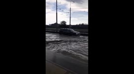 Torrential thunderstorm turns Krasnodar streets into rivers as tractor battles flooding
