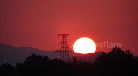 Power Grid Tower in The Sunrise Sun in Yichang, China