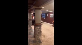 Homeowner creates incredible ‘man-cave’ in basement - including full bar, movie theatre and bookshelf with secret door