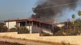 Houses burn from rampaging wildfire in Athens, Greece