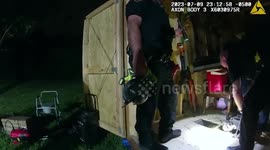 Pet Rottweiler dog stuck under a shed rescued in Texas by police officers