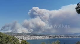 Wildfire near Athens triggers evacuation orders as heatwave scorches country