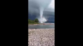 Tornado with rainbow wows residents in Tuapse, Russia