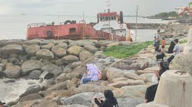 Shipwrecks Due to Extreme Weather Become a New Tourist Attraction in the City of Padang on July 18, 2023.
