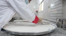 Palestinian vendors prepare sweets ahead of high school exams