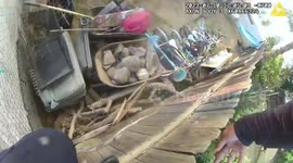 Hero policeman rescues pet dog from burning home in California