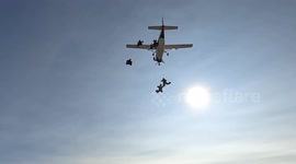 Breathtaking footage of skydivers as they set new British record for largest sequential formation dive