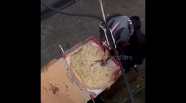 Delivery man caught on camera eating customer's pie in Russia