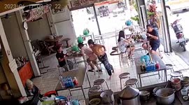 Massive python sparks panic when it slithers through restaurant