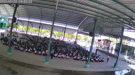 Scared pupils flee when large monitor lizard disrupts school assembly
