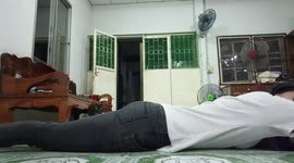 Pet cat massages owner's back and legs in DIY spa