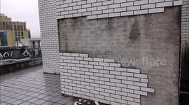 Tiles Fall Off The Exterior Wall of A High-rise Residential Building in Yichang, China