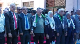 Palestinians participate in the opening ceremony of the Italian Tower rehabilitation project in Gaza city.