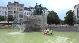 Antwerp couple finds novel way to cool off during Europe's heatwave