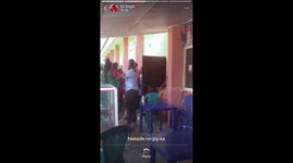 University student refuses to open book for another student to look into and write in exam hall leads to violence