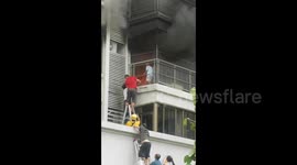 Good Samaritans save 6-year-old boy from raging apartment fire in southern China
