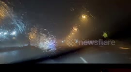 Dangerous Driving Through Rain and Fog on a Florida Highway