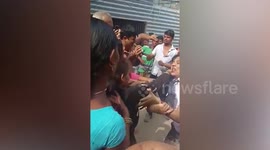 Pilot and husband attacked by revenge mob for 'beating girl, 10, they employed as maid'
