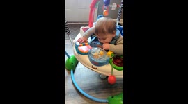 Baby boy jumps right into sleep after trying his best to show mom he's awake