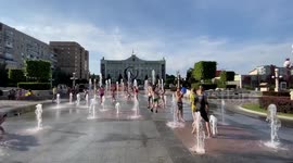 Children Play at The Water Fountain on The Main Square in Irpin, Ukraine