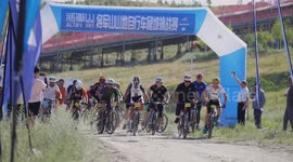 Cycling race held at Xinjiang's ski resort in summer