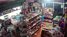 Storm batters shop as Typhoon Talim affects Thailand
