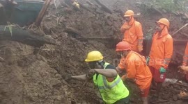 At least 108 people trapped under debris and 16 killed in India landslide