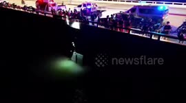 Firemen save woman who fell from bridge while trying to take selfie