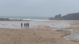Howling wind and rain leave Cornish beach deserted on first weekend of school summer holiday