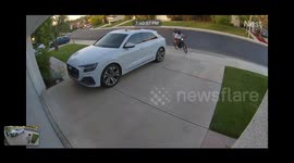 Kid Drives  Dirt Bike Into Garage Door