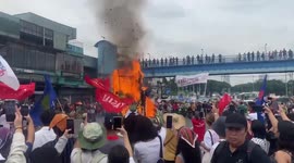 Protesters burn controversial Philippine president's effigy ahead of national speech