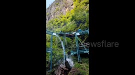 Chinese tourists narrowly escape injuries as inflatable rafts collide on broken glass slide
