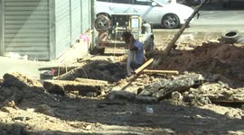 Palestinians inspect damage following military raid in Tulkarm, West Bank