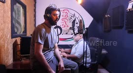 Former Palestinian prisoner sings national anthem in studio