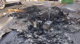 Palestinian residents inspect damage following Israeli military raid at Askar refugee camp