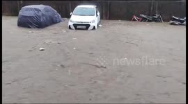 Cars submerged in water as floods hit India's Gujarat