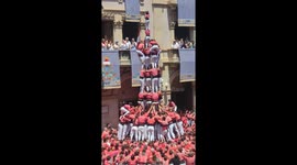 Group create human tower NINE floors high in impressive show of balance and strength