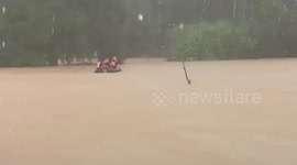 Coast Guard rescues families stranded in Typhoon Doksuri floods
