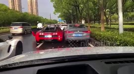 Rare supercar collides with BMW after forcefully lane change in China