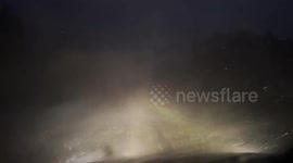 Storm chaser vehicle hit by very powerful straight line winds and large hail