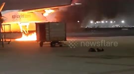 Fire rips through plane's engine at airport in Delhi, India