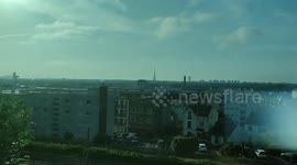 Eiffel Tower traveling panoramic view from train. Sunset in Paris suburb, France, Suresnes, Le Val d'Or. 26 july 2023. (# commuter).