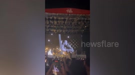 Pop singer Matty Healy kisses bandmate in Malaysia but is accused of 'setting back gay rights'