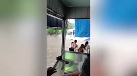 Cars struggle through Super Typhoon Doksuri floods in the Philippines