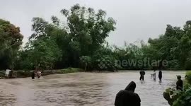 Disaster officials rescue residents stranded in Typhoon Doksuri floods