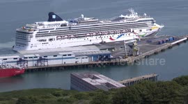 The First Cruise Ship At Portland Port Gets Close Up Views Of The Bibby Stockholm Immigrants Barge