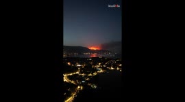 Captivating drone footage shows ruthless wildfire scorching Corfu Island under the night sky